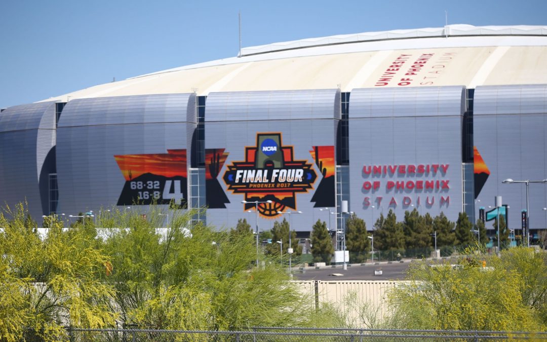 Final four in Phoenix; Racist graffiti removed; Trump goes after conservative group