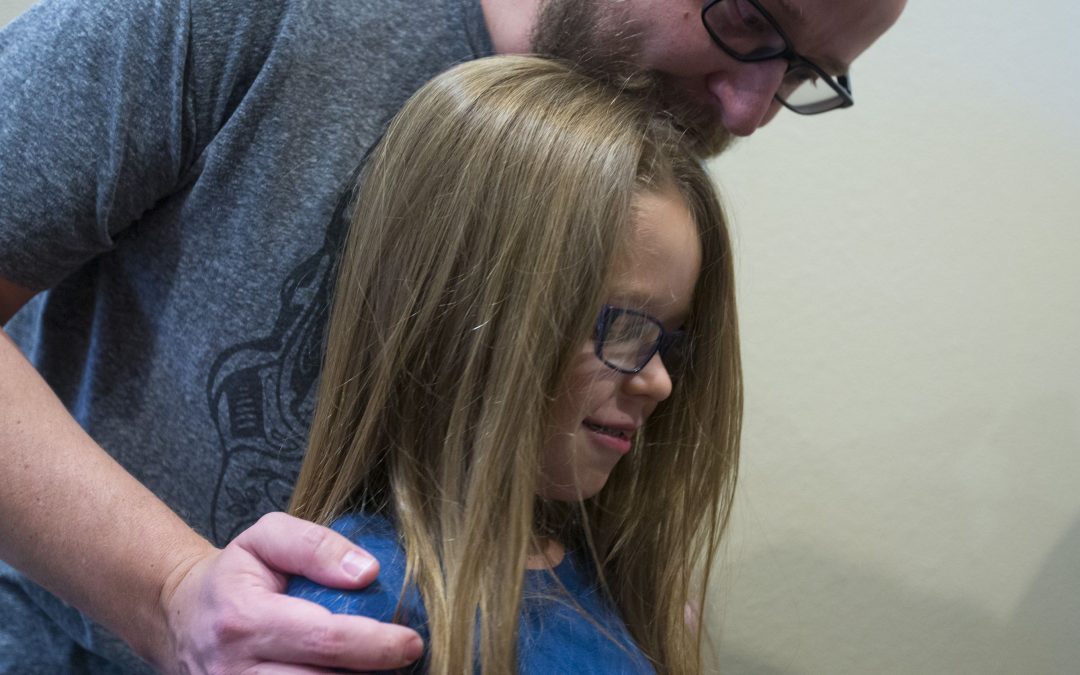 Boy, 7, donates flowing locks to cancer victims