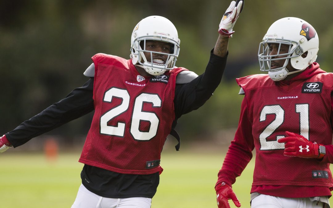 Who starts opposite Patrick Peterson?