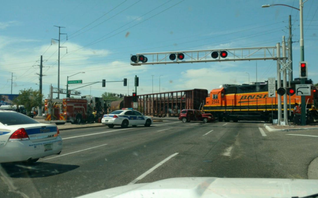 Train, car collide in west Phoenix; intersection closed