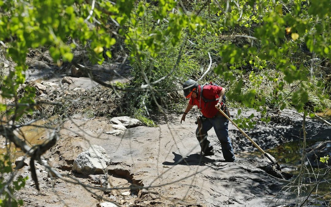 Storm cuts off search for missing Arizona flash-flood victim