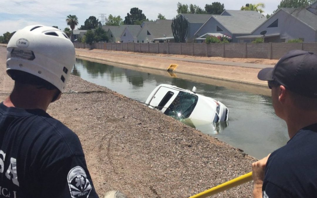 Man rescued from roof of car after it plunges into Mesa canal