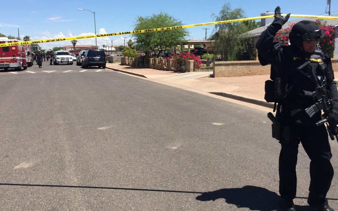 Shooting suspect surrenders to police after 2 wounded in Phoenix