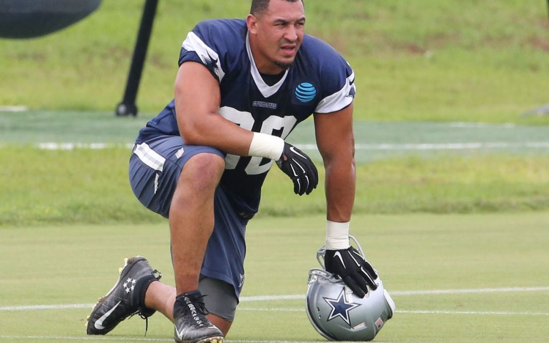Cowboys’ Tyrone Crawford carted off with apparent right ankle injury