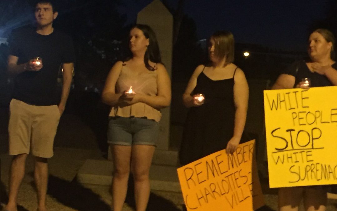 Anti-Trump group holds Phoenix vigil for Charlottesville victims