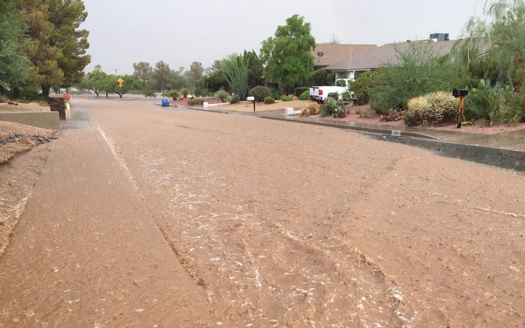 Major storm moves into Phoenix area, flooding streets, washes