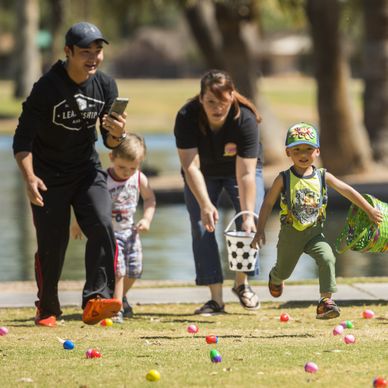 Families gather for Easter egg hunt at Encanto Park in Phoenix 2019