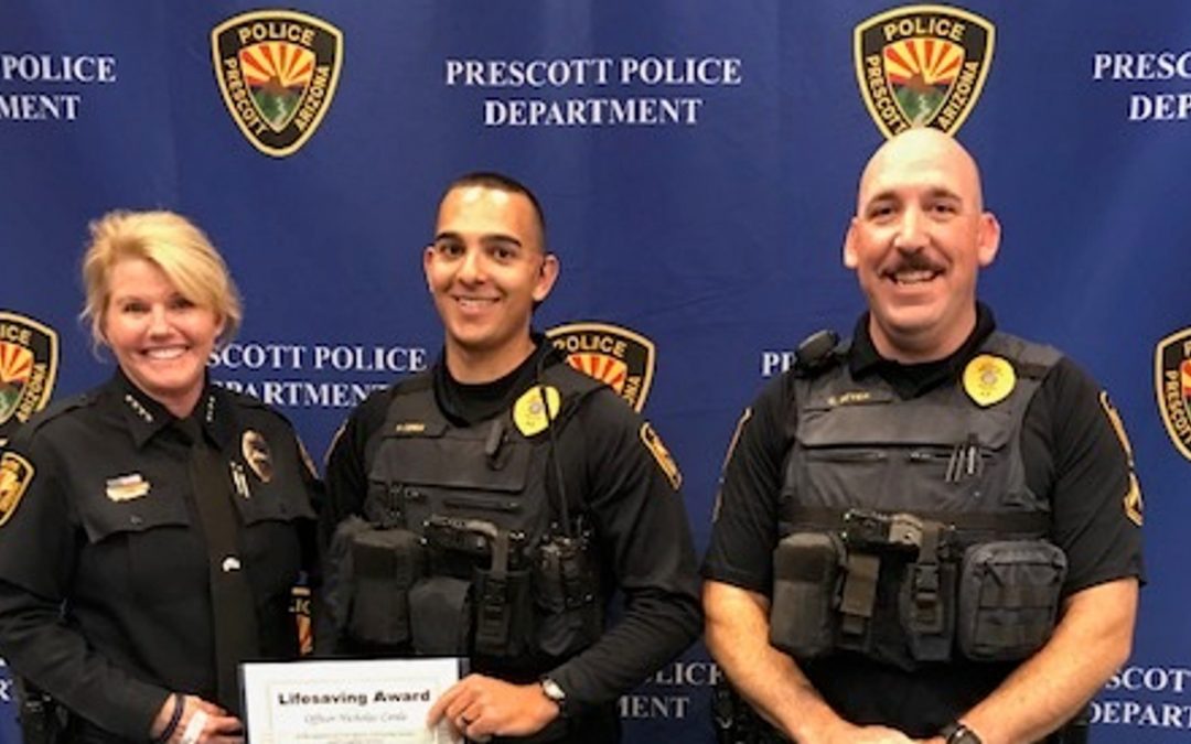 Officers were awarded on Wednesday for saving a man’s life in April.