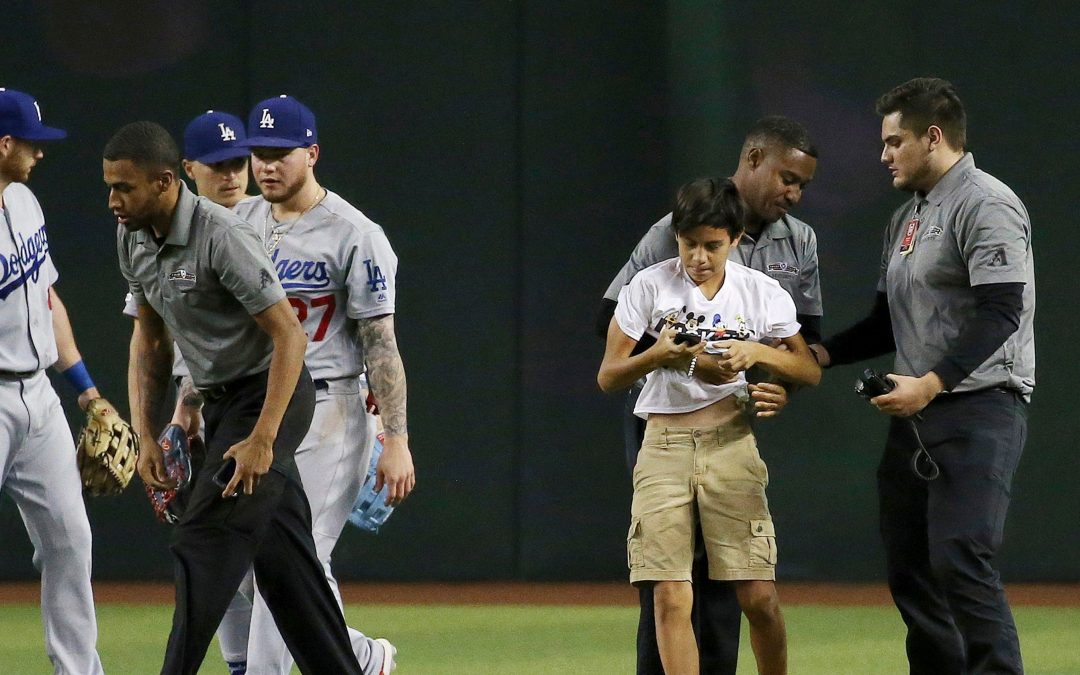MLB fans running onto field at Dodgers games prompting safety concerns