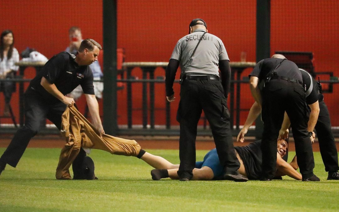 MLB fans keep running on the field, and lately at Diamondbacks games