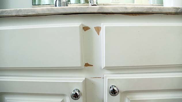 How to Repair and Paint Plastic-Coated Melamine Cabinets