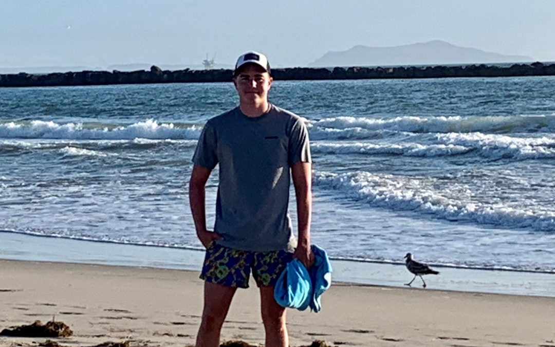 Brophy’s Henry Palmer fights off challenges to finish marathon swim