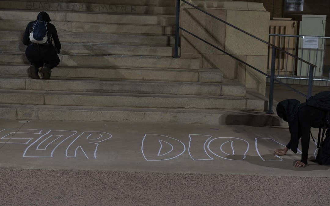 People gather in Phoenix to protest Dion Johnson's death on Sept. 22, 2020.