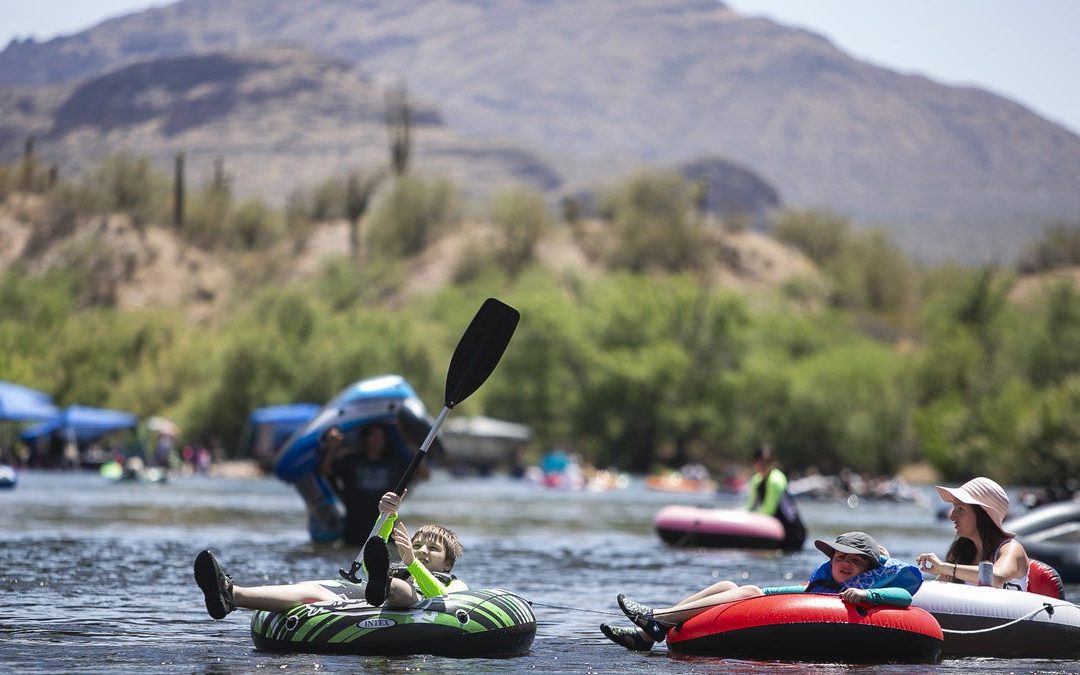 Tubers and kayakers enjoy the Salt River in the Tonto National Forest