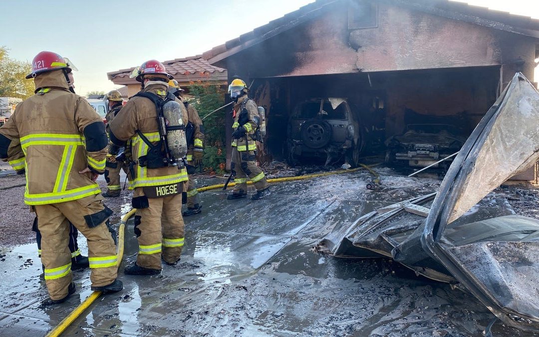 Phoenix home burns after car bursts into flames