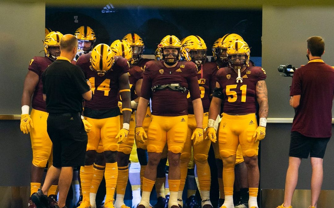 ASU football looked snazzy in traditional maroon and gold uniforms