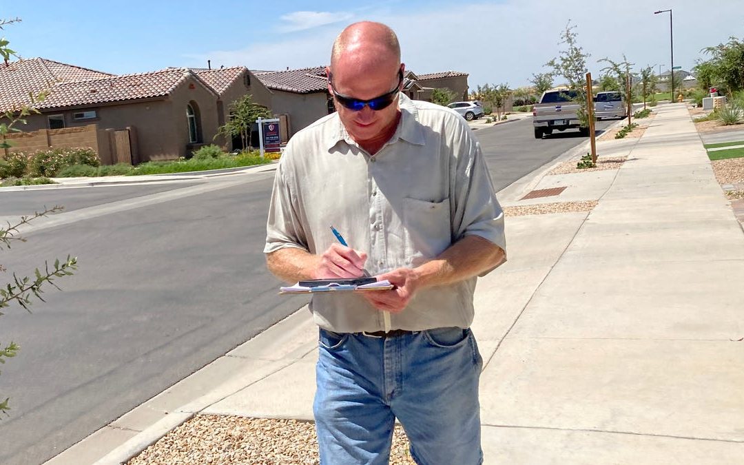 Volunteers canvass East Valley neighborhood to question voters